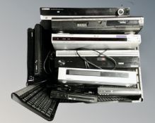 A crate of nine assorted DVD players, Samsung, Toshiba,