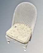 A mid century loom bedroom chair
