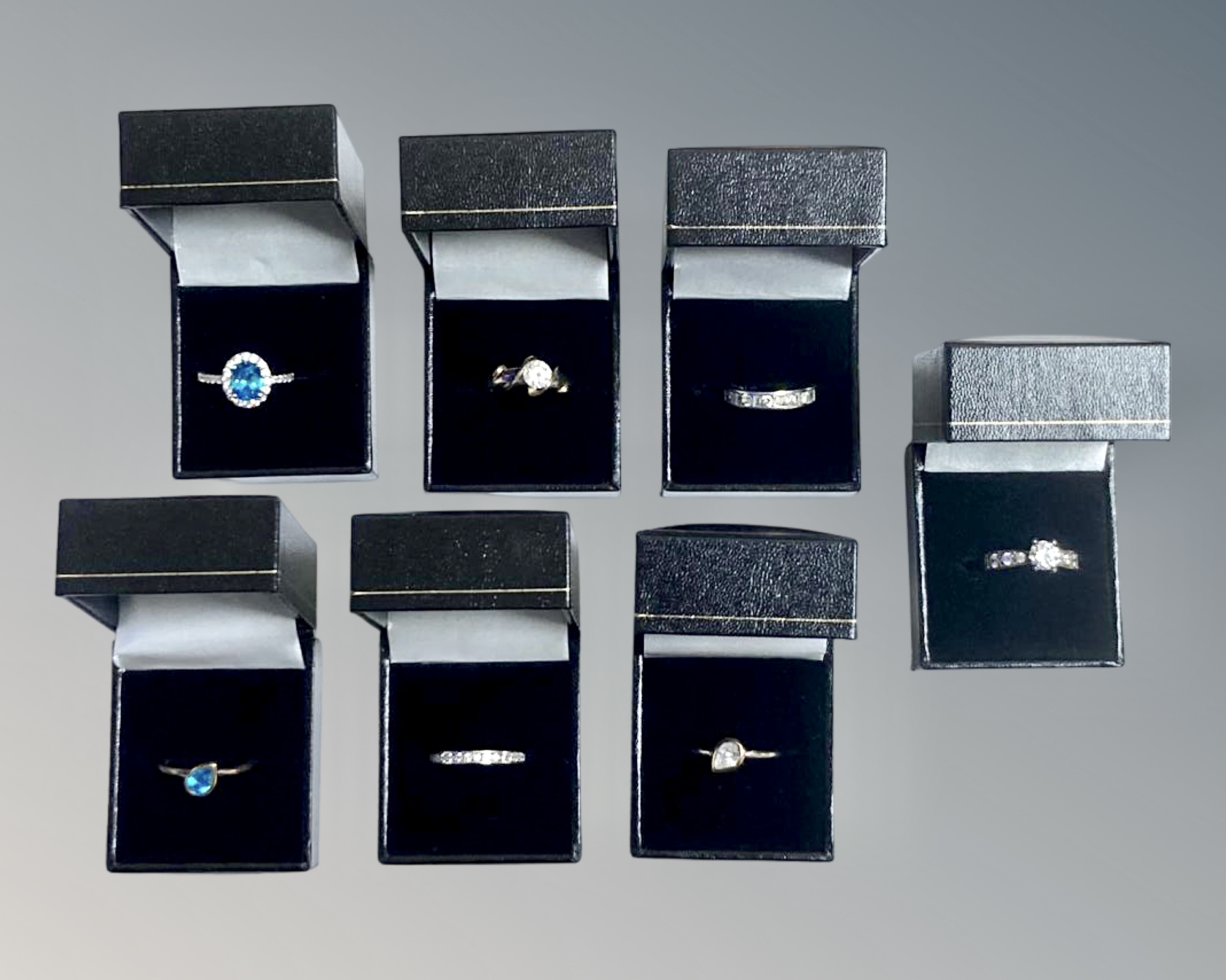 Seven Sterling silver dress rings.