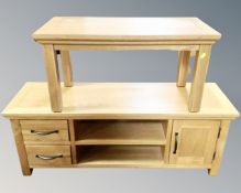 A contemporary oak entertainment stand with matching coffee table