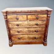 A Victorian mahogany five drawer chest with pillar supports,