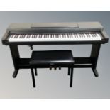 A Yamaha Clavinova CLP-560 electric piano with advanced wave memory together with stool and