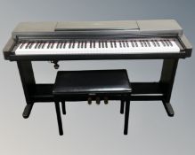 A Yamaha Clavinova CLP-560 electric piano with advanced wave memory together with stool and
