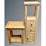 A contemporary oak plant stand fitted cupboard and two drawers beneath together with similar