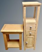 A contemporary oak plant stand fitted cupboard and two drawers beneath together with similar