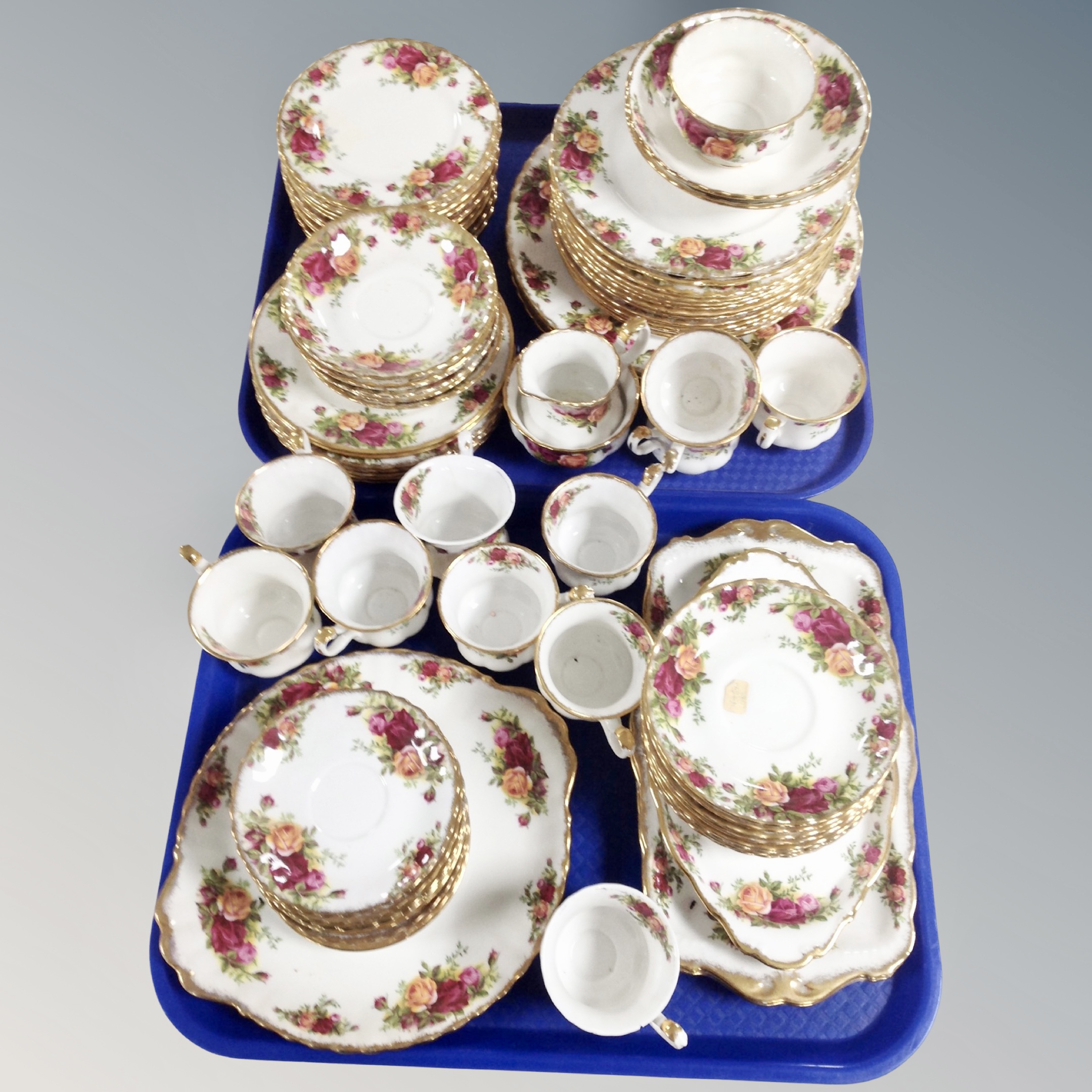 A collection of 77 pieces of Royal Albert Old Country Roses tea and dinner china.