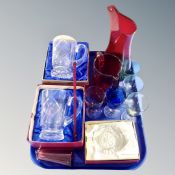 A tray containing assorted glassware including boxed Wedgwood crystal tankards and paperweights,
