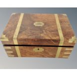 A Victorian walnut brass bound fitted travelling writing box.