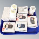 A tray containing four Vodaphone 354 mobile phones, boxed,