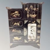 A 20th century Japanese lacquered table chest.