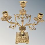 A Victorian brass three way table candelabrum. (height 24.