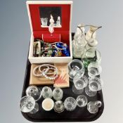 A tray containing a 20th century musical jewellery box containing costume jewellery,
