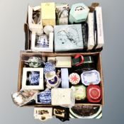 Two boxes containing boxed Ringtons ceramics, die cast cars, Ringtons tins, chintz tea ware etc.