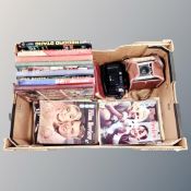 A box containing mid-20th century film,
