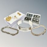 A cuff bangle stamped 925, two bracelets and four pairs of earrings.