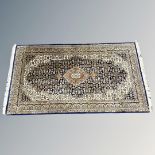 A Tabriz rug, Iranian Azerbaijan, 90cm by 161cm.