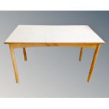 A mid-20th century melamine topped kitchen table.