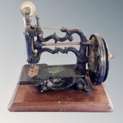 A 19th century hand sewing machine.