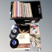 A box containing vinyl LPs, box sets and 7" singles including Elvis Presley, Tony Christie,