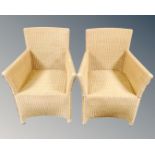 A pair of Marks & Spencer wicker armchairs