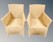A pair of Marks & Spencer wicker armchairs