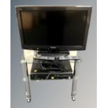 A Panasonic Viera 26" LCD TV together with a Panasonic DMR-EZ47V DVD/VCR recorder, both with leads,