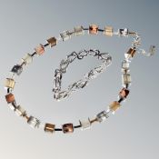 A Coeur De Lion glass and white metal necklace together with an encrusted white metal Swarovski