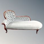 A Victorian style chaise longue in buttoned dralon