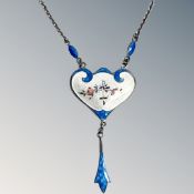 An early 20th century silver and enamel pendant on chain