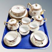 A 20 piece 20th century Japanese export eggshell tea service.