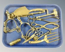 A tray containing assorted brass ware including a French lighter in the form of a bullet,