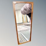 A mid-century teak framed mirror, 41cm by 91cm.