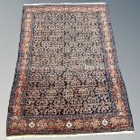 A Feraghan rug, West Iran, circa 1930, 145cm by 192cm.