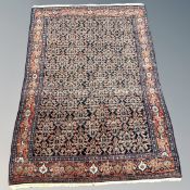 A Feraghan rug, West Iran, circa 1930, 145cm by 192cm.