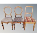 A pair of antique oak bedroom chairs together with a further single chair.