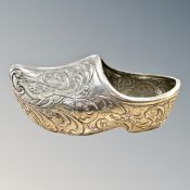 A silver racing trophy in the form of a shoe, won by Julian Sutton, engraved 'World Cup Races,