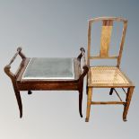 An Edwardian oak two tier piano stool