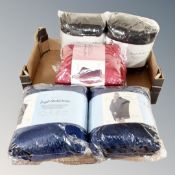 A box containing five Emma Barclay snuggle blanket hoodies, new.