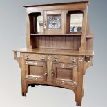 An oak Arts and Crafts sideboard,