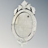 A Venetian style all glass mirror,