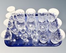 A tray containing assorted glass and lead crystal drinking vessels.