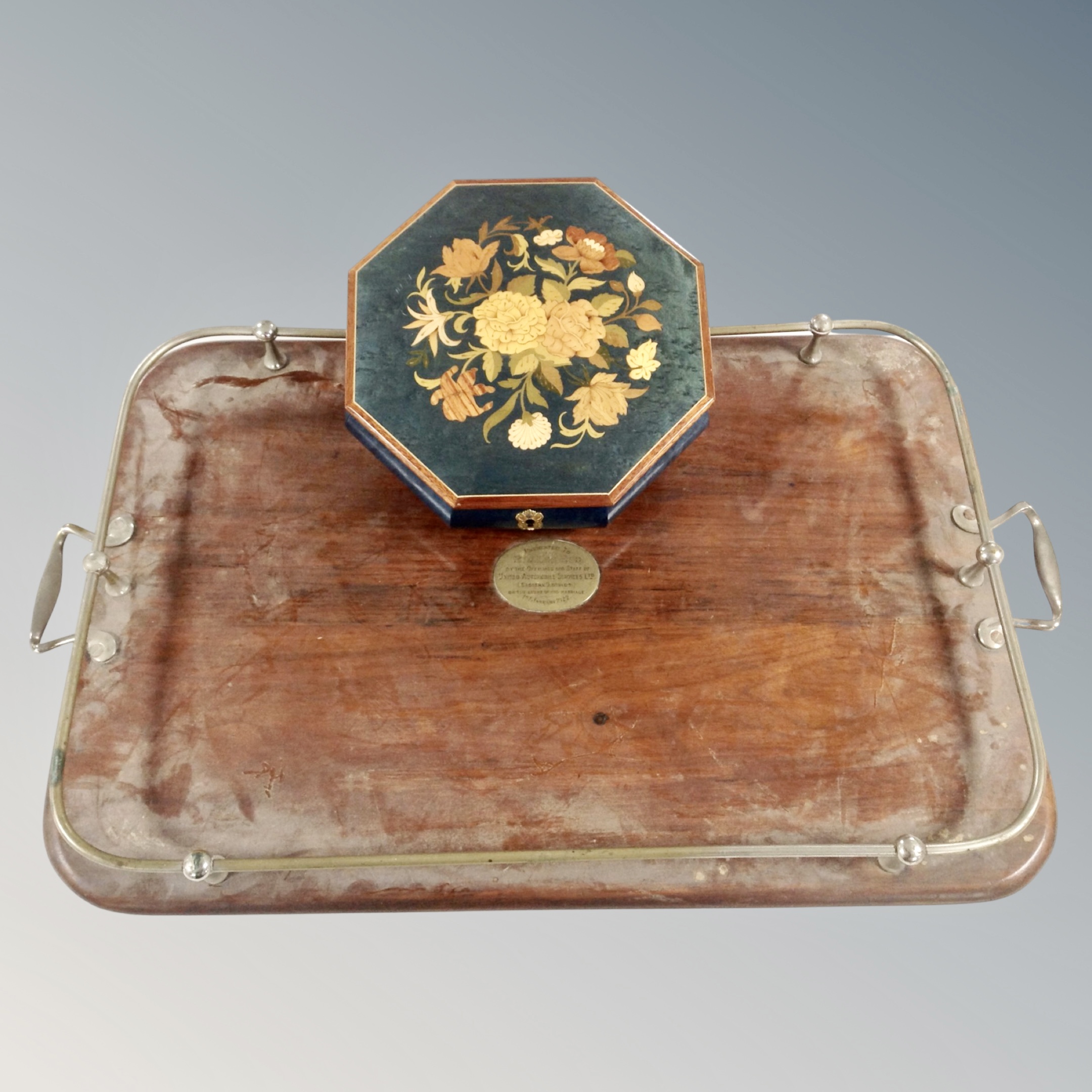 An Edwardian twin handled serving tray with metal gallery together with an Isle of Capris Mapsa