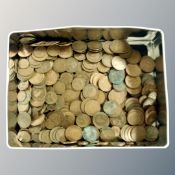 A tin containing 20th century British copper coins.
