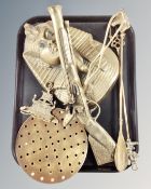 A tray containing brass ware including an Egyptian mummy wall plaque, musket, chestnut roaster,