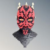 A Lego (MOC) 10018 Darth Maul head.