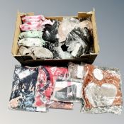 A box containing approximately 20 pieces of new and tagged lady's clothing and underwear including