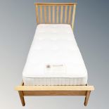 A contemporary rail 3' bed frame with Staples Impressions Extra interior