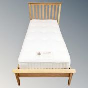 A contemporary rail 3' bed frame with Staples Impressions Extra interior