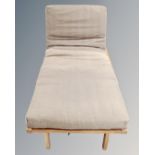 A Futon Company sofa bed oak linear trifold (single) with cover