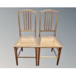 A pair of Edwardian oak bedroom chairs